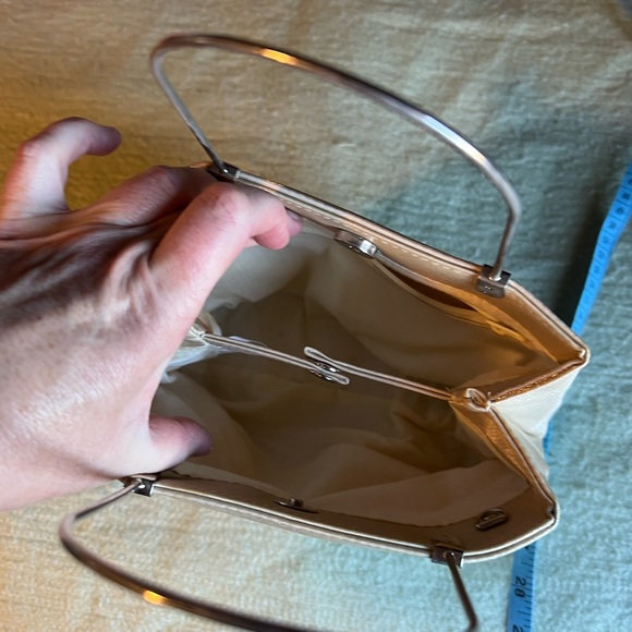 Soft champagne colored cocktail handbag with metal hardware - Picture 9 of 12